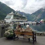 Sitting on a bench in Geiranger watching the cruise ships and the harbor.